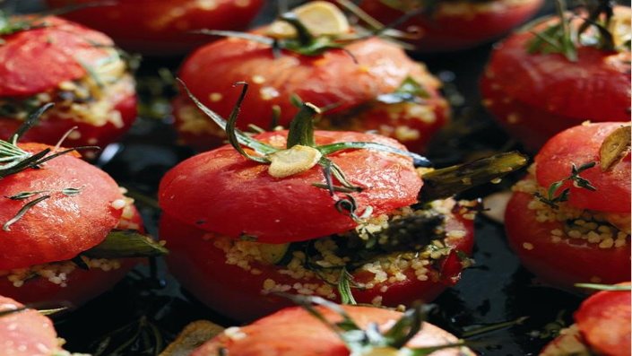 vine ripened tomato stuffed with couscous salad